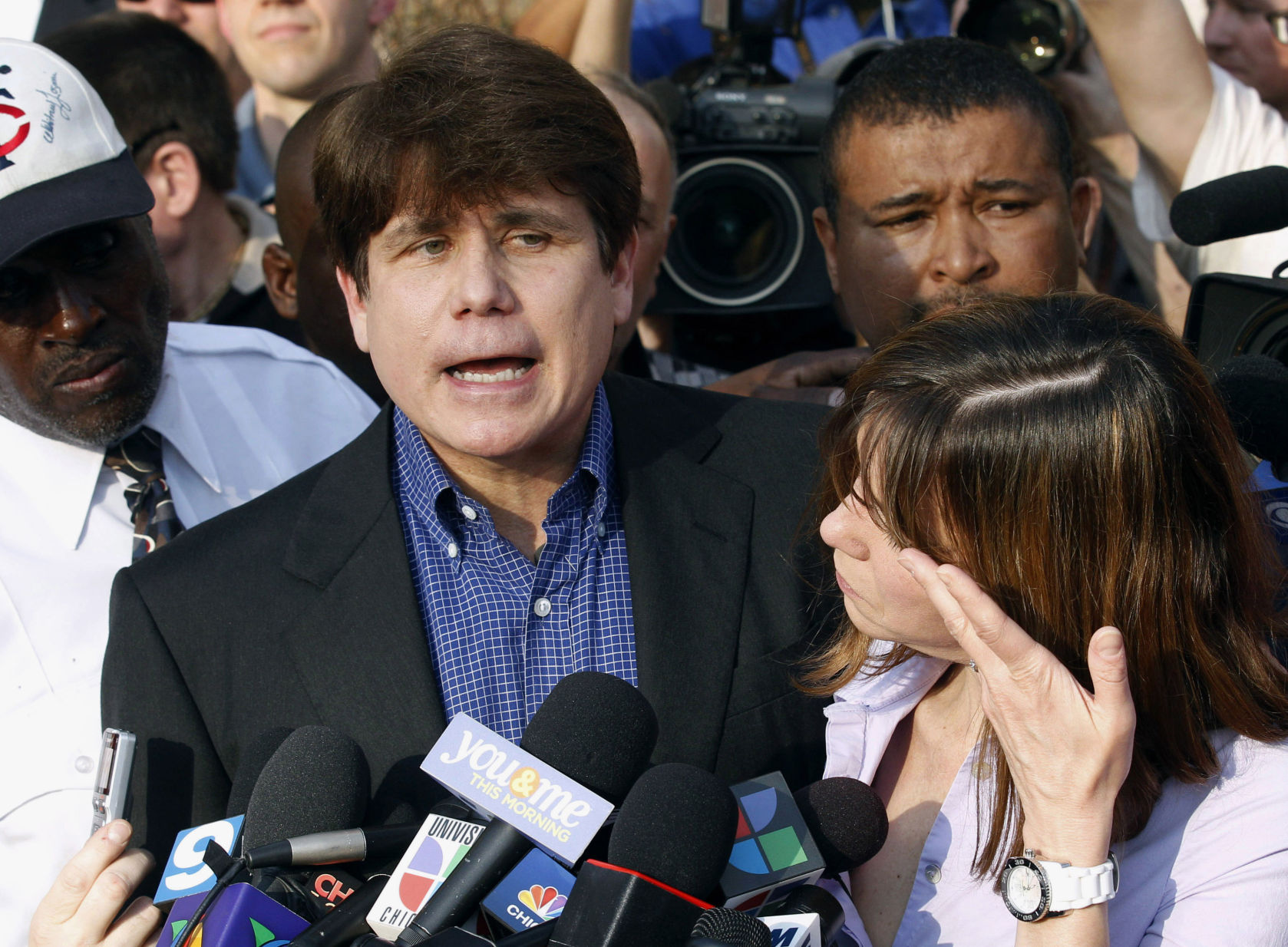 Speaks to media